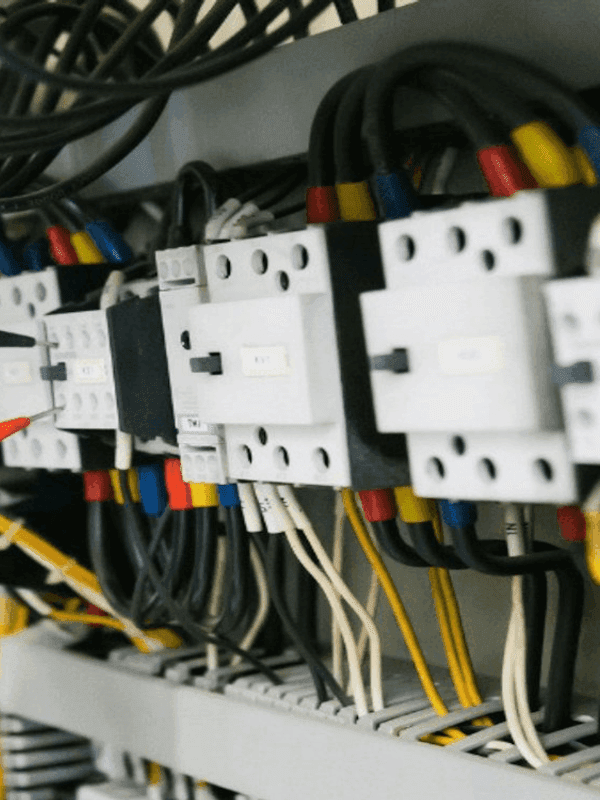 Electrical services technician at work